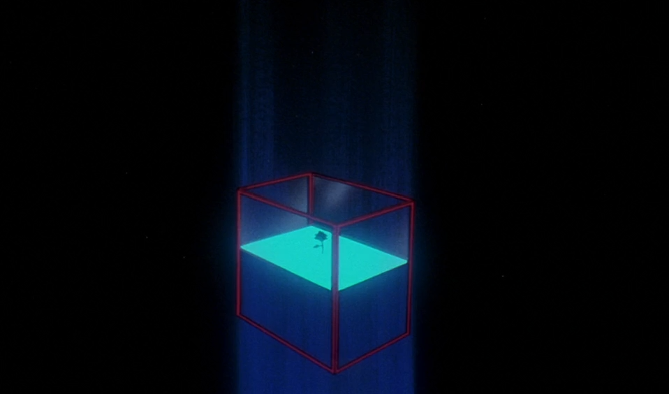 A glowing glass box outlined in red floats in a beam of blue light against darkness, a tiny black rose standing on its luminous turquoise floor.