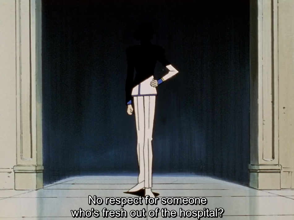 Ruka, in a black and white uniform with one hand on his hip, stands silhouetted in a doorway against a dark curtain, seen from behind. The subtitle reads “No respect for someone who’s fresh out of the hospital?”
