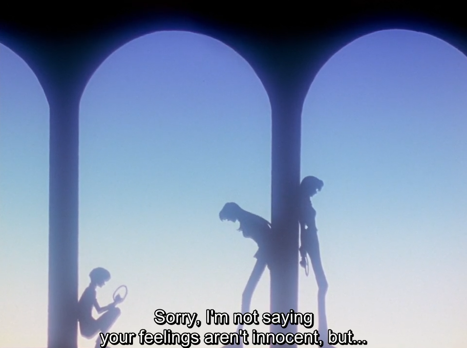 Silhouettes against a pale blue sky between arched pillars: Juri leans against a pillar with her locket dangling from her hand, Utena bends forward beside her, and a small figure sits at the base of another pillar. The subtitle reads “Sorry, I’m not saying your feelings aren’t innocent, but…”