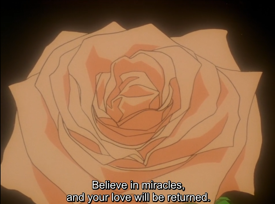 A close-up of a large pale peach rose against a black background. The subtitle reads "Believe in miracles, and your love will be returned."